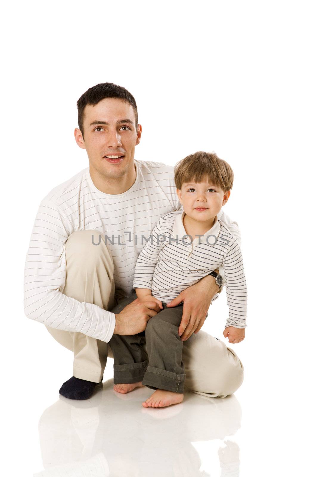 Happy Father holding son sitting isolated on white