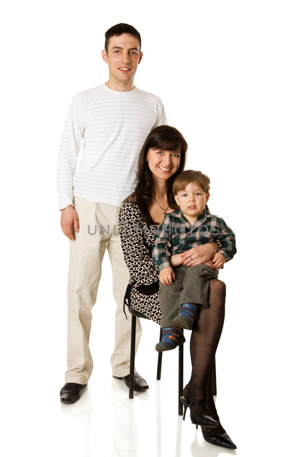 Happy young family portrait isolated on white