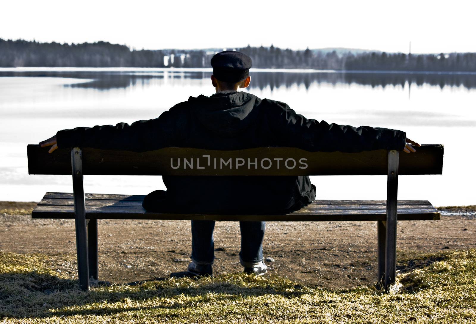 man sitting on a bank