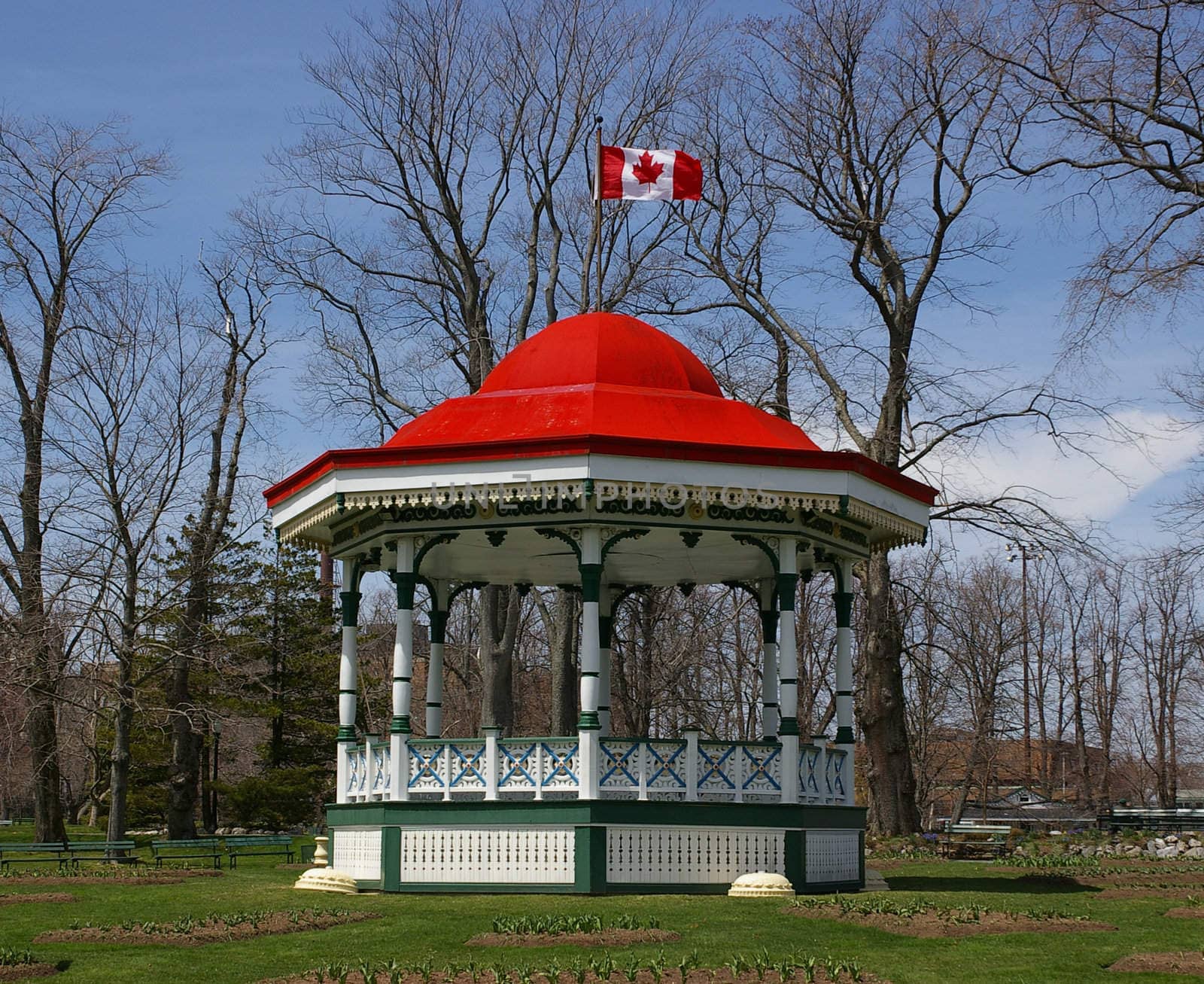 A historic bandstand with the flag flying high.
