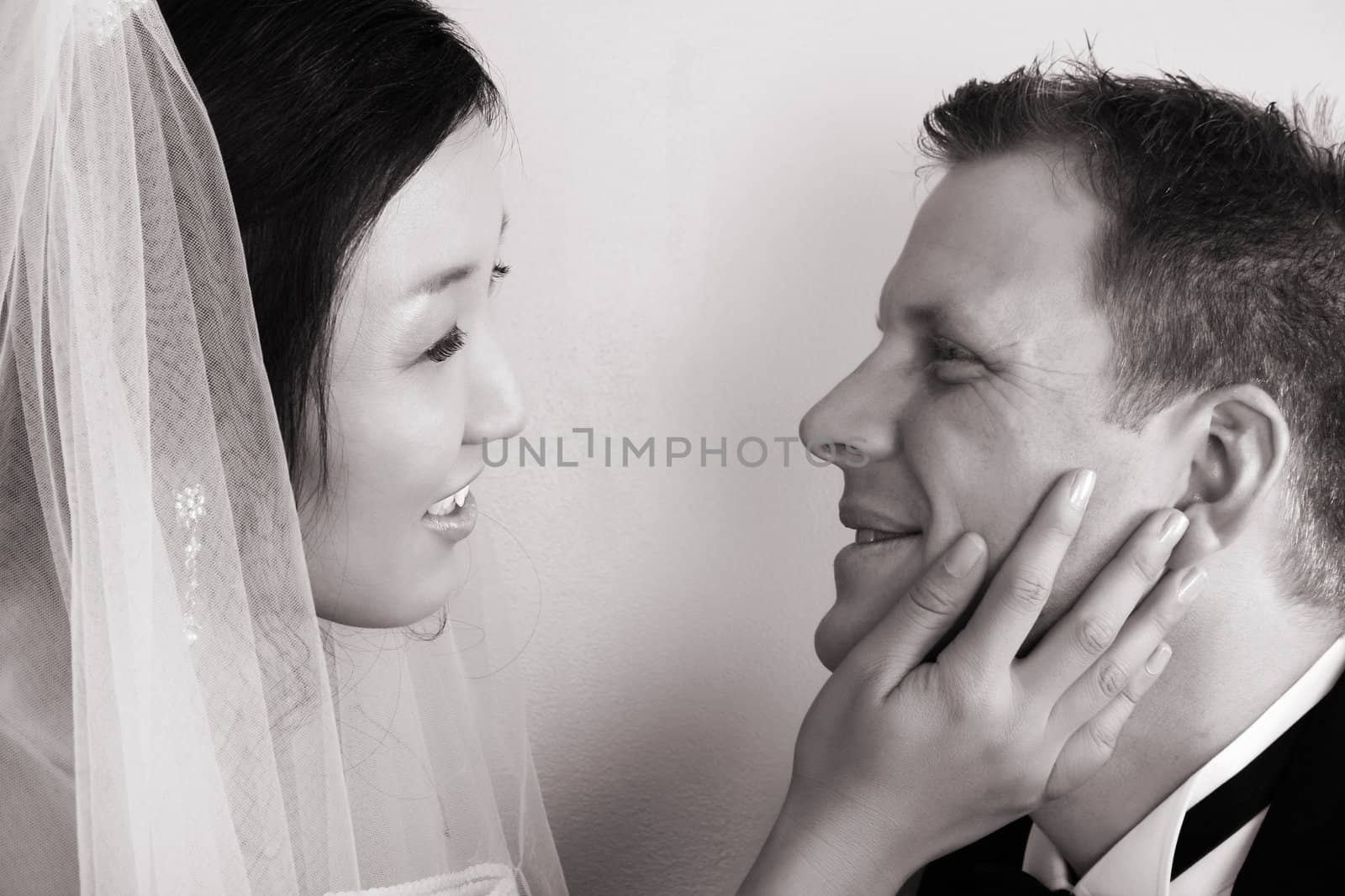 Bride looking at groom on their wedding day