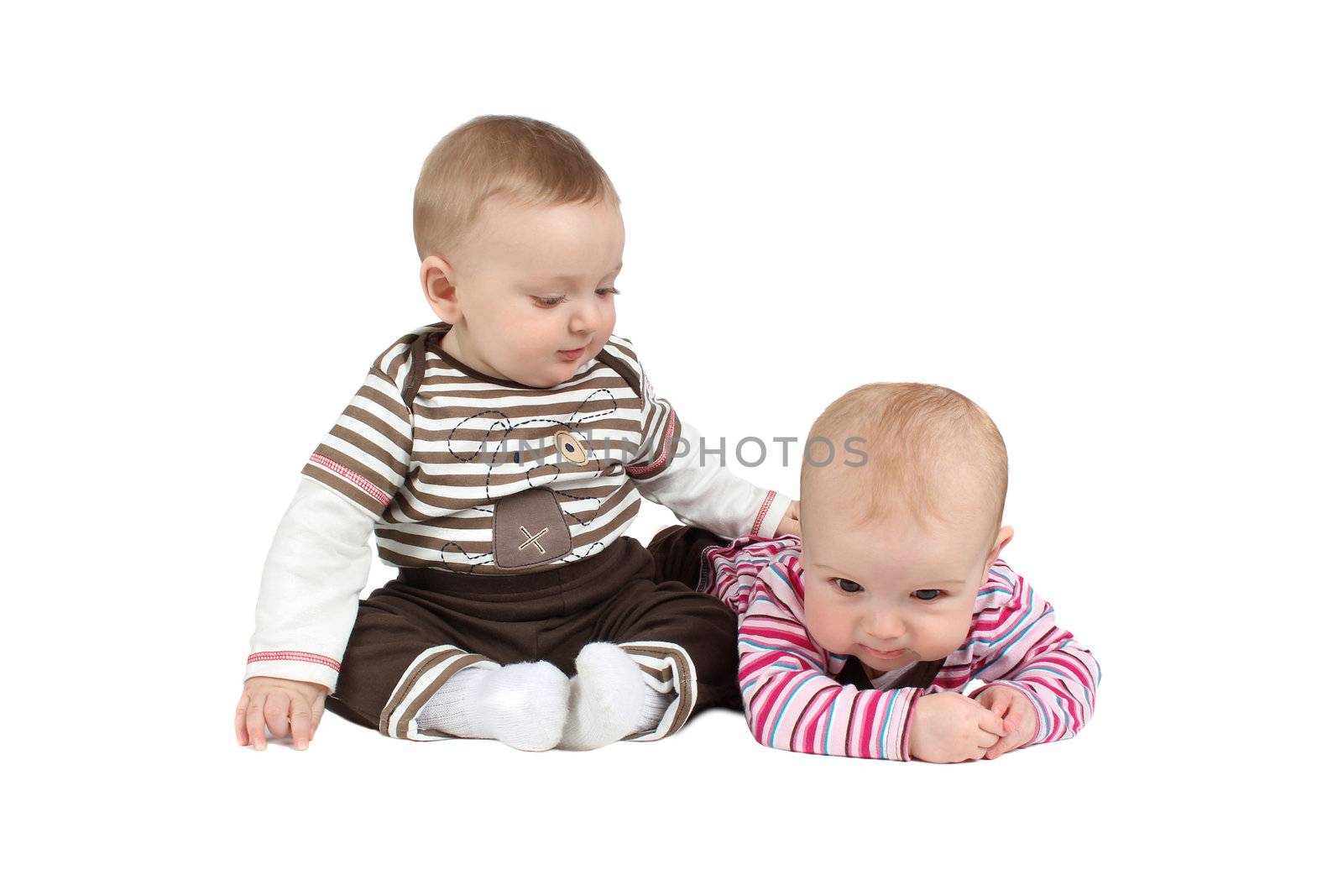Baby boy and girl wearing striped clothing