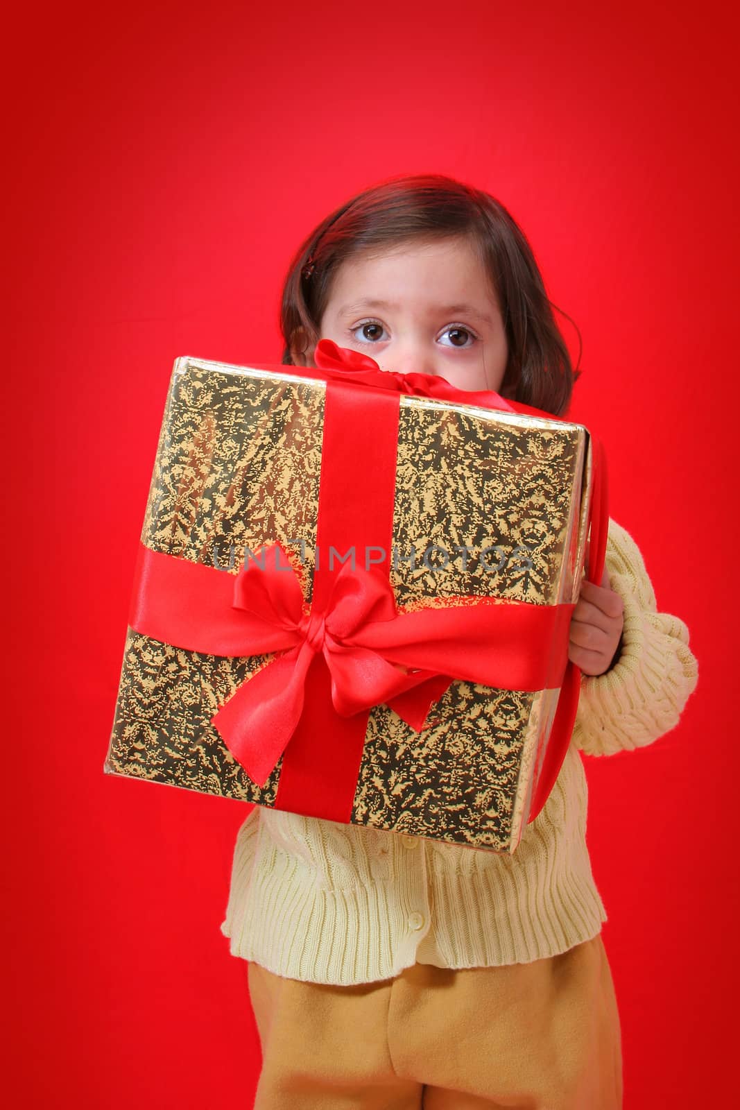 Toddler with a christmas gift by Erdosain