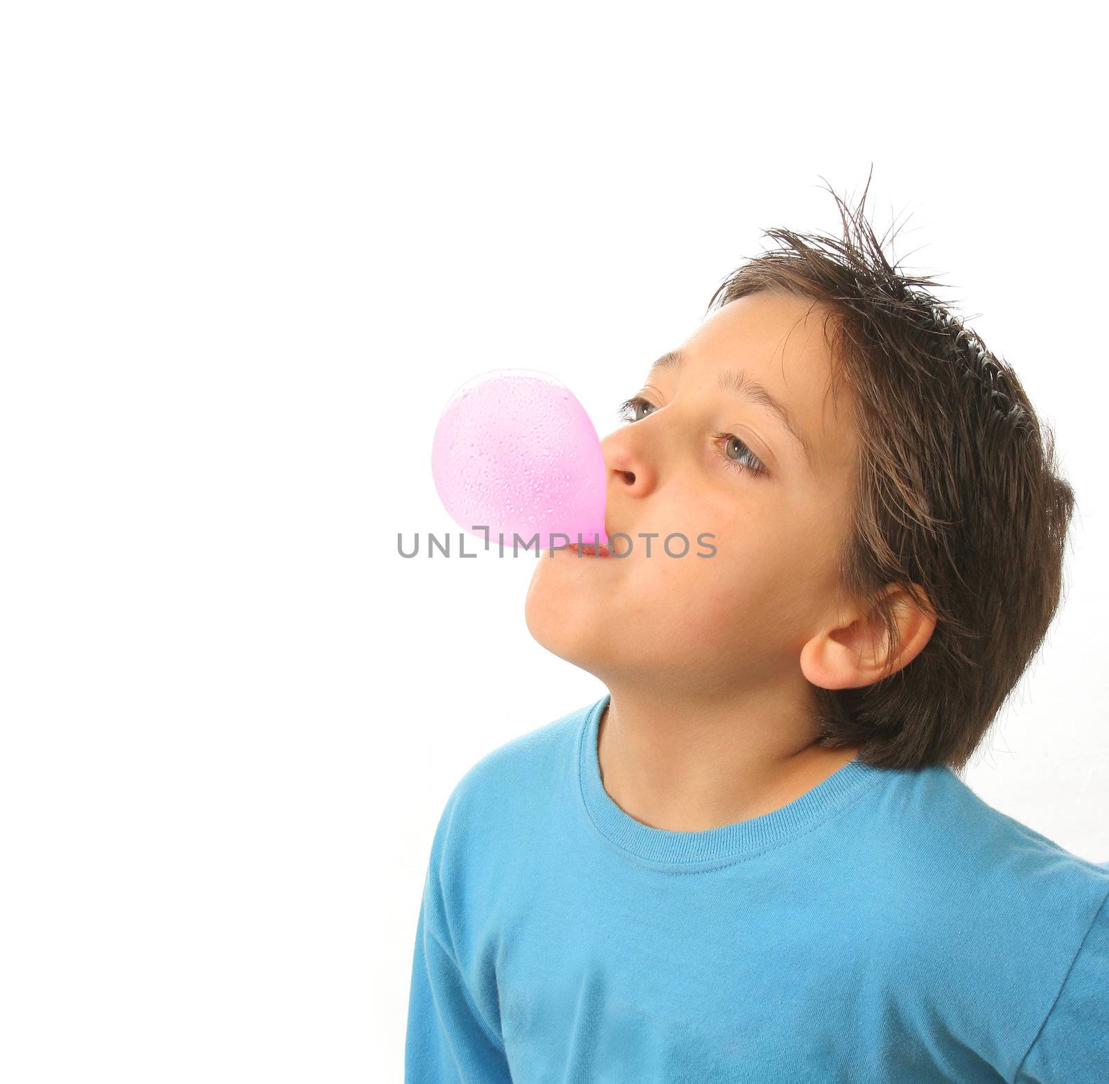 Boy blowing a pink bubble gum by Erdosain