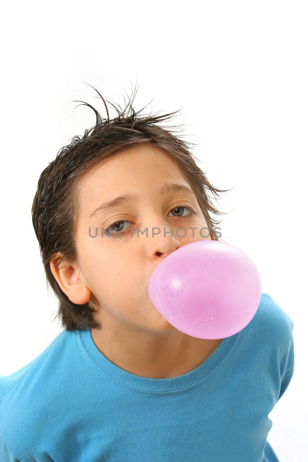 Boy blowing a pink bubble gum by Erdosain