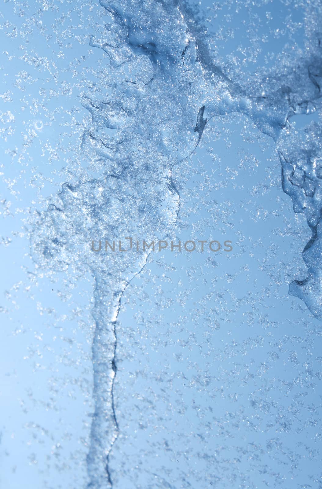 frozen water drops with blue background