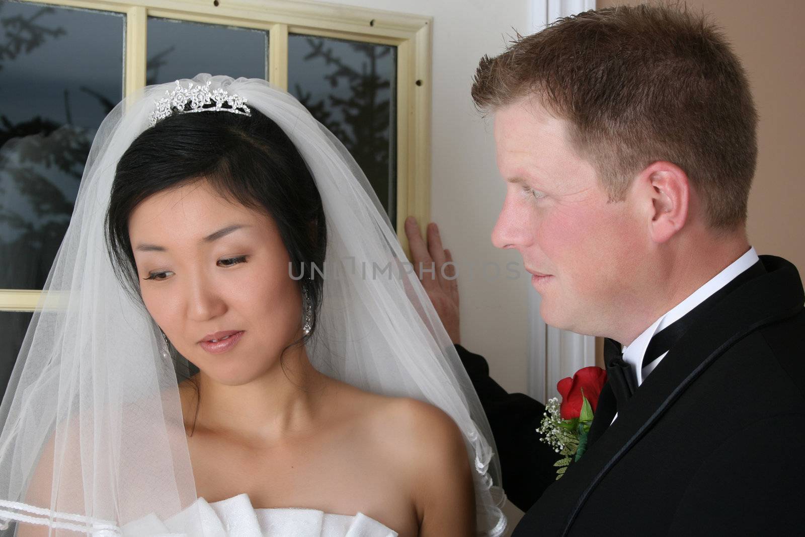 Beautiful couple on their wedding day in traditional attire