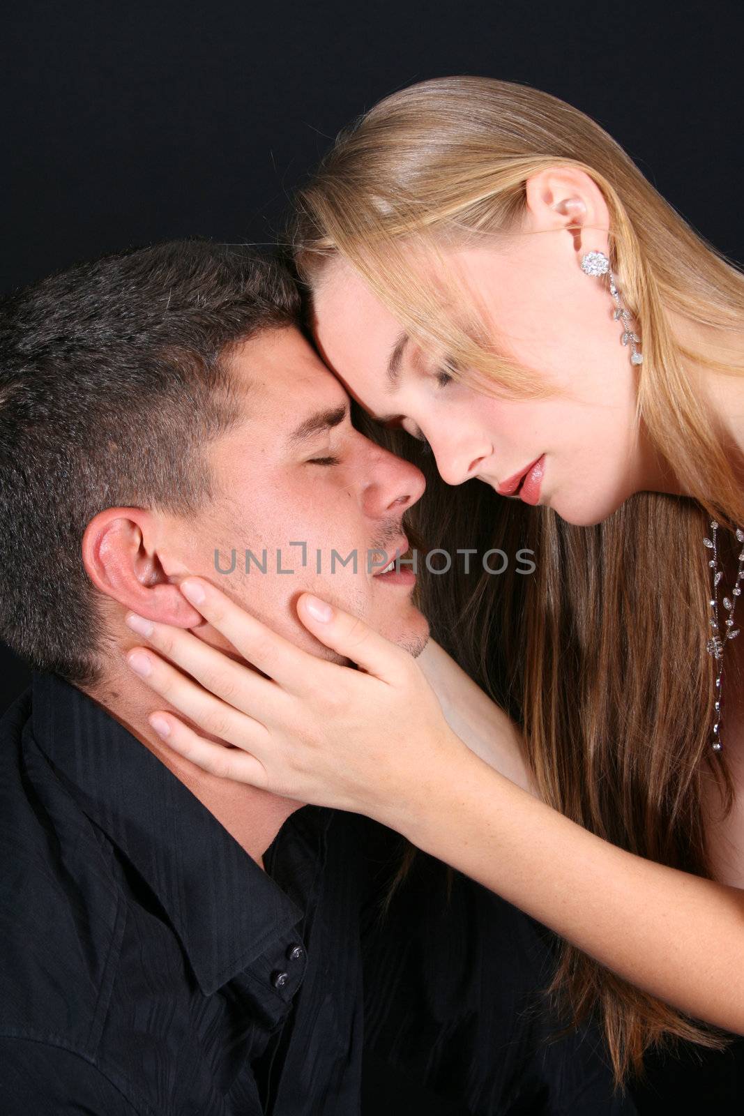 Young couple in love, faces close to one another