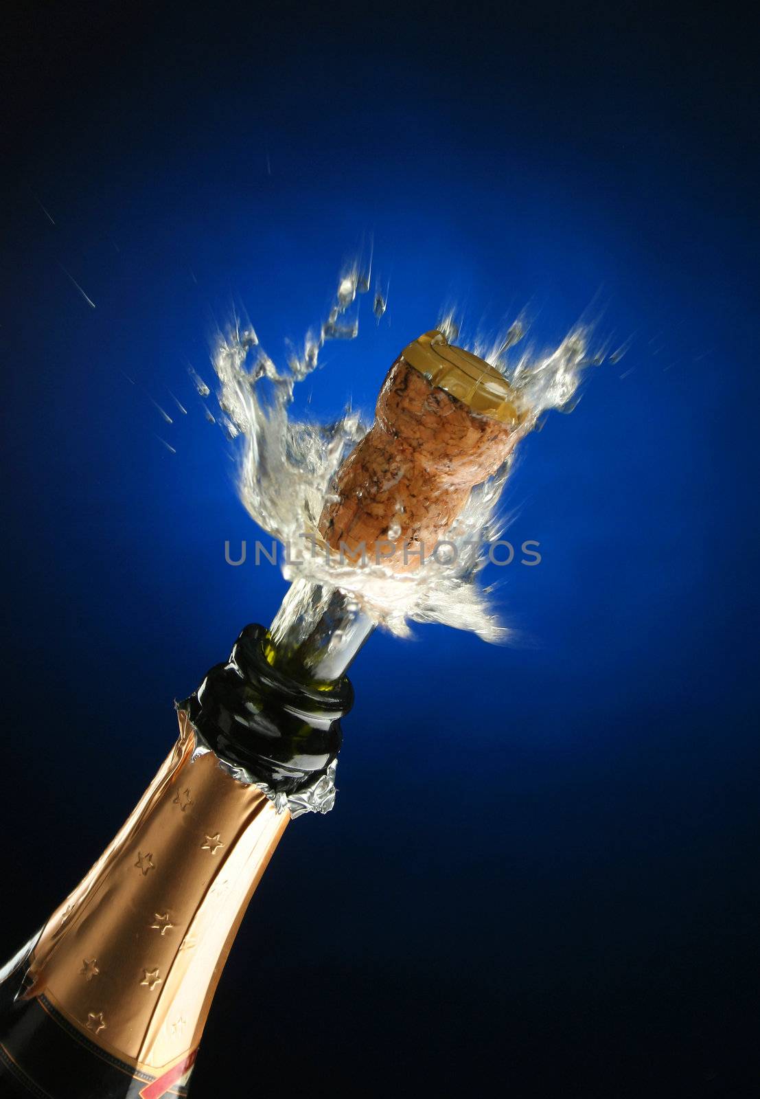 Champagne splash. Bottle and cork, celebration time 