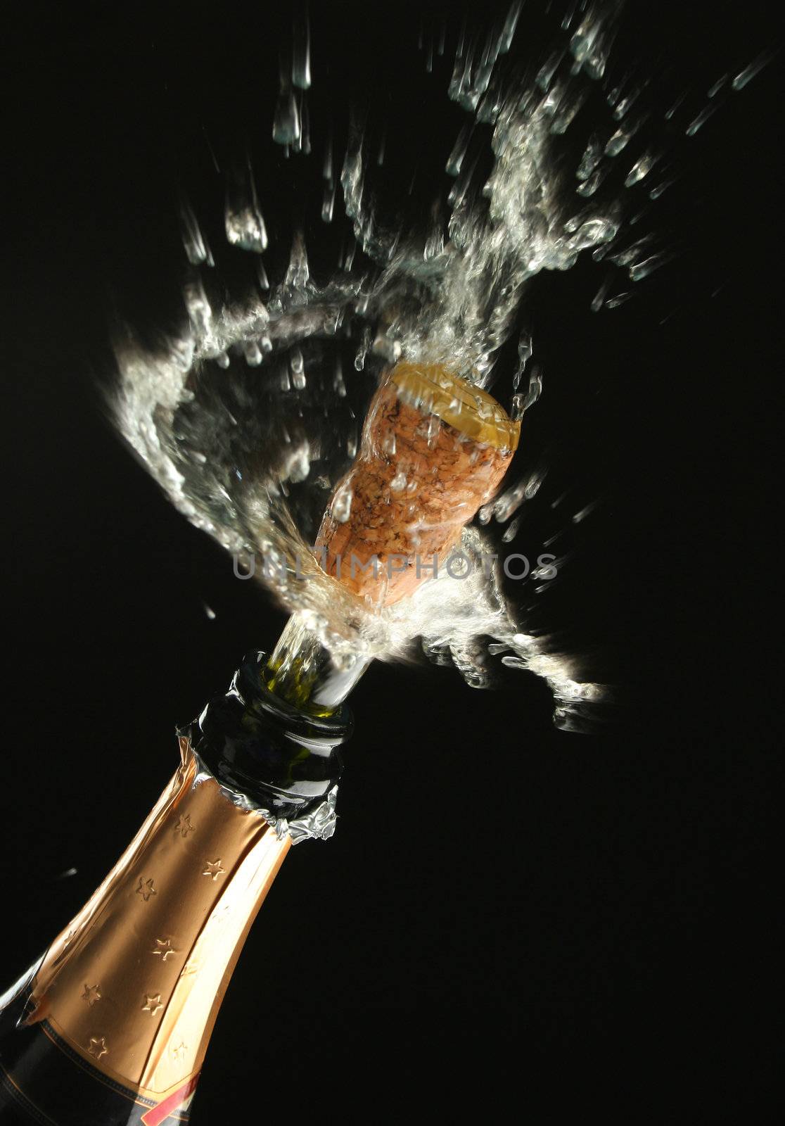 Champagne splash. Bottle and cork, celebration time 