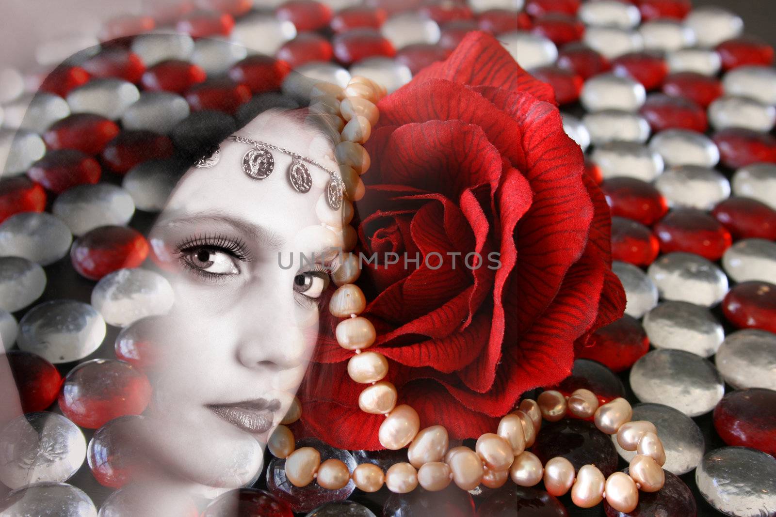 Female model withwearing folk dress layered with pebbles and jewelery