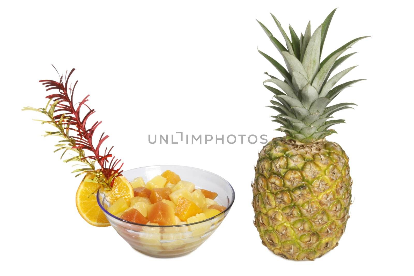 Fruit salad with different tropical fruits - isolated on white background