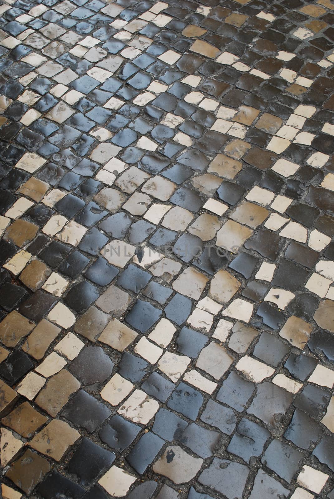 photo of a colorful pavement made of portuguese typical stones