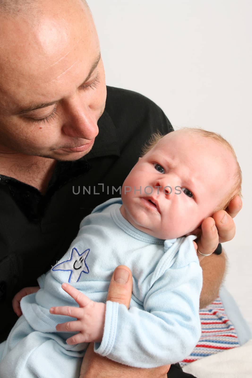 Father and Baby boy on a white background