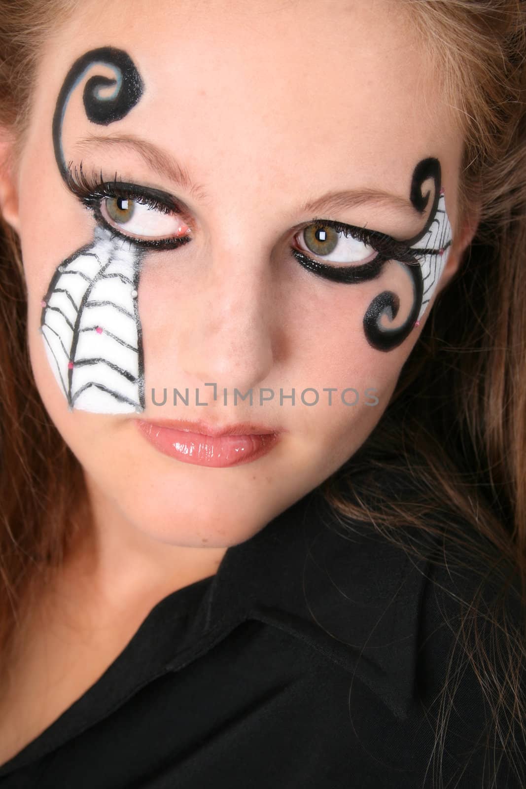 Close-up of Halloween teenager with face paint