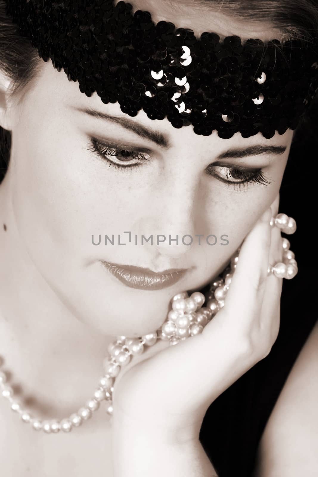 Beautiful young female in 1920 style attire