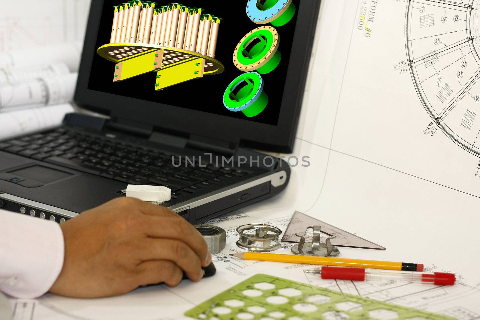 Computer design of machine parts by sacatani