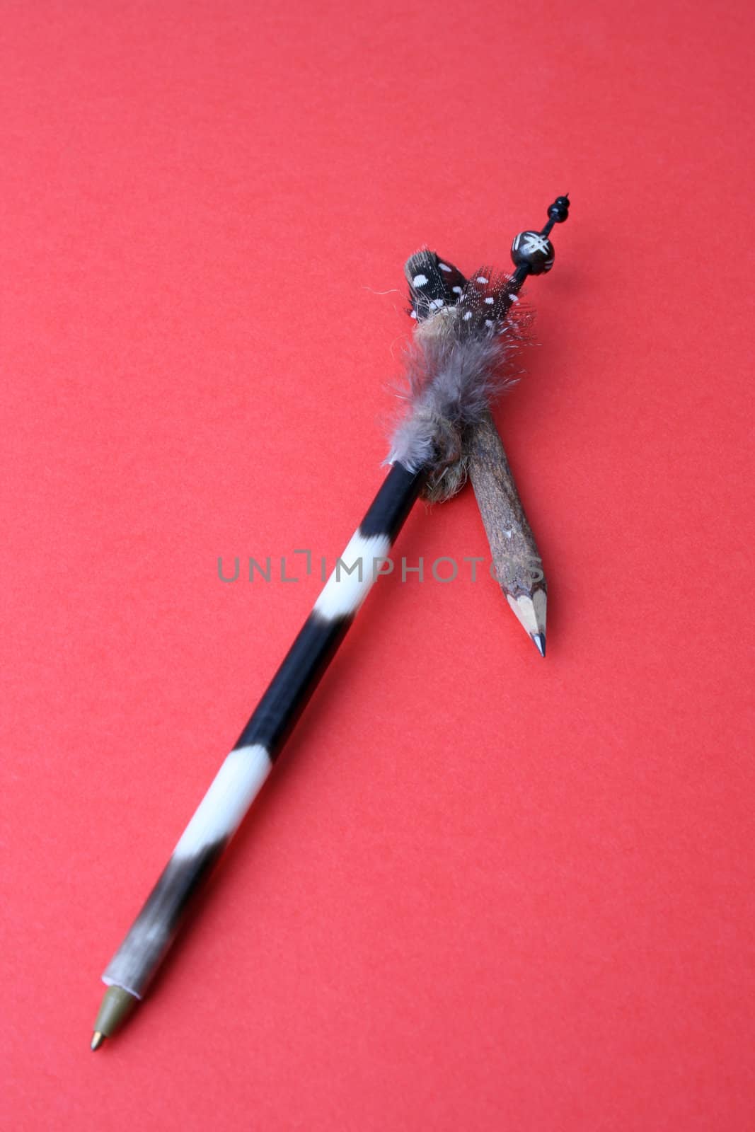 Ethnic Quill Pen and wooden pencil with feathers