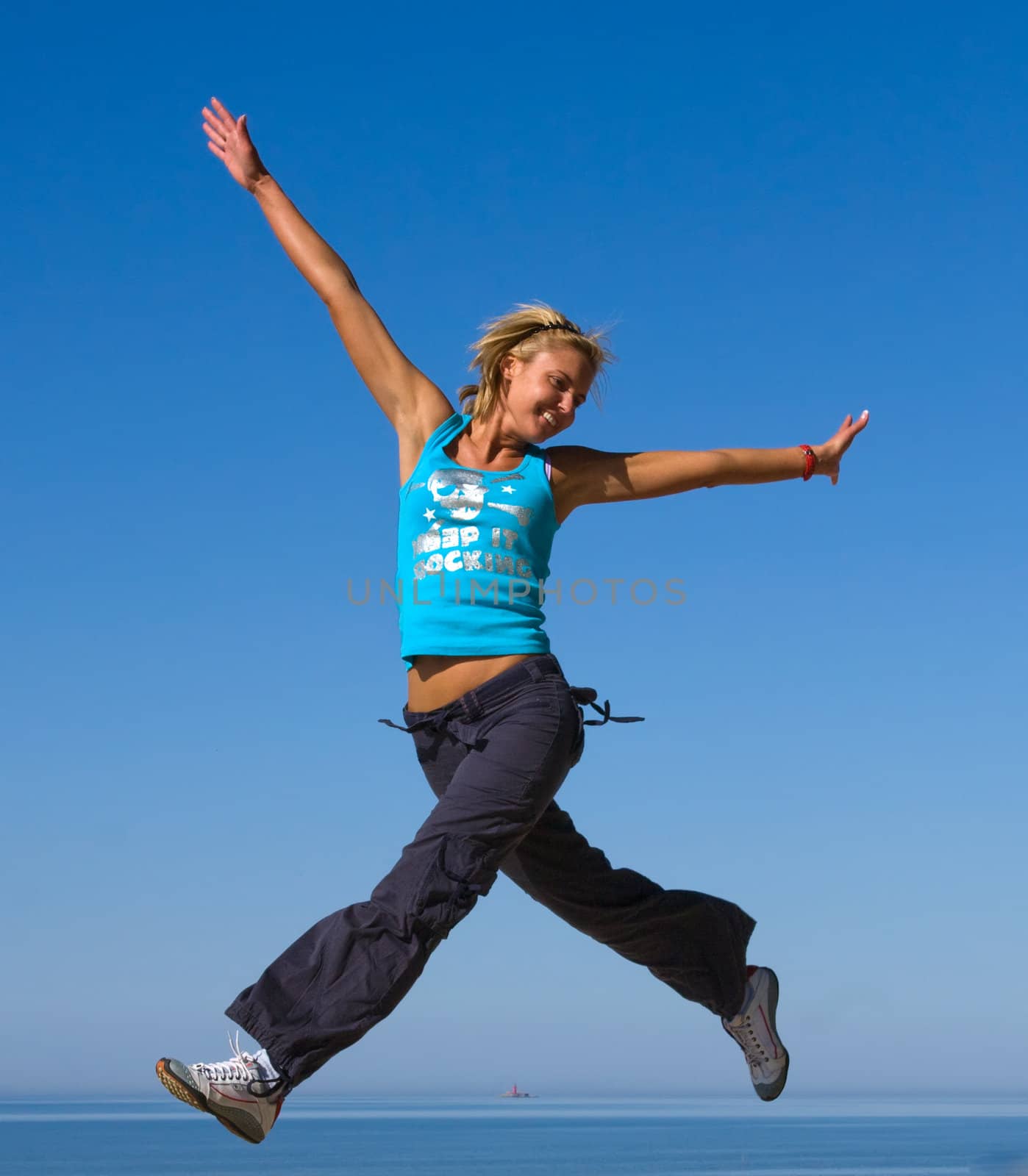 jumping girl blue sky high