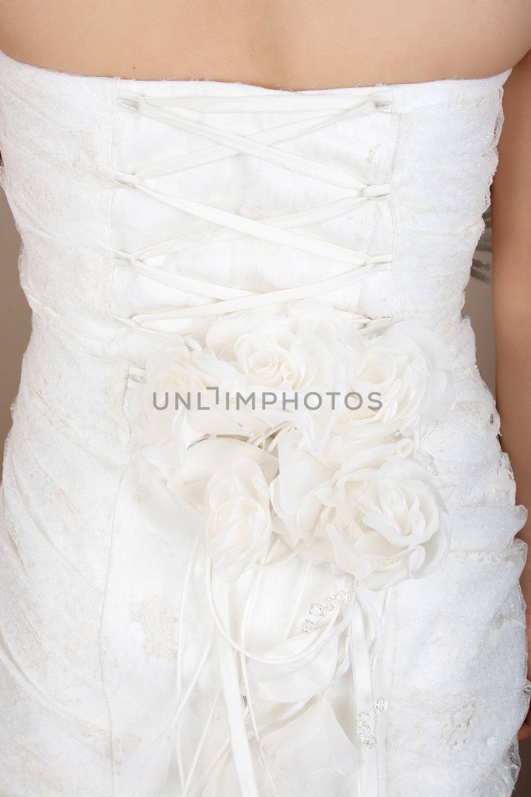 Floral and lace detail on the back of wedding dress