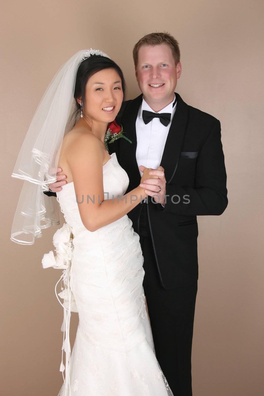 Beautiful couple on their wedding day in traditional attire 