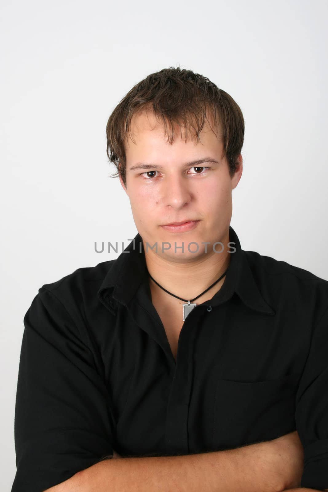 Male model against a white wall background