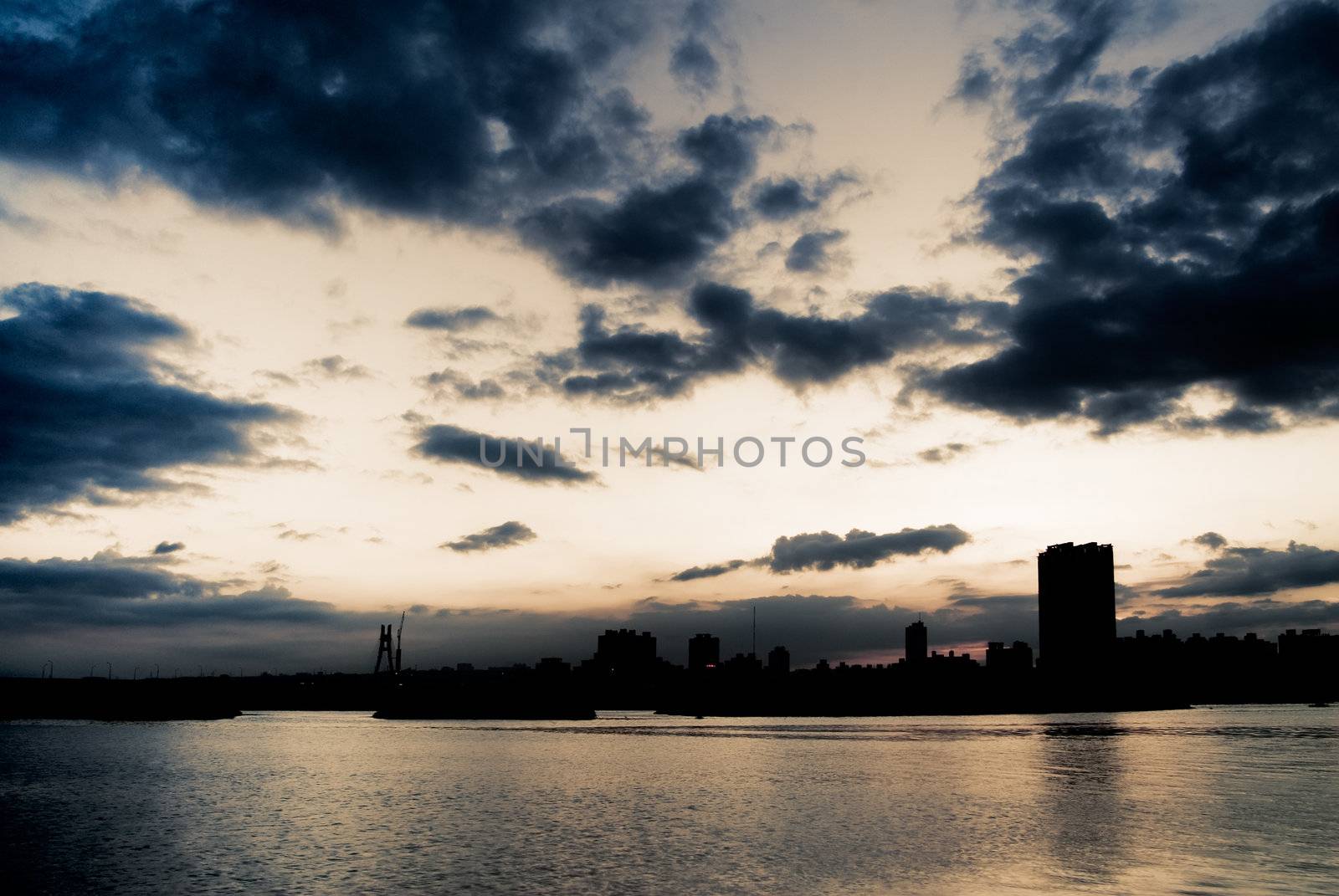 Here is city night scene with the river in Taiwan.