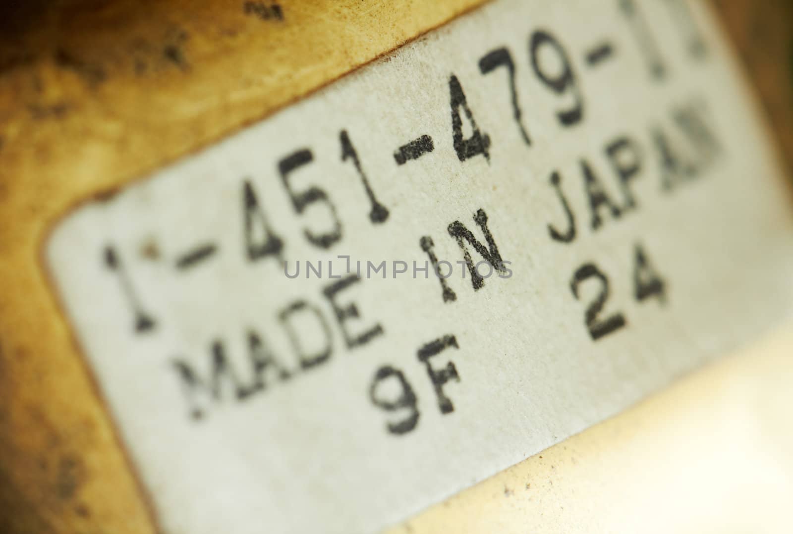 Macro of a label sticker, dusted. by pashabo