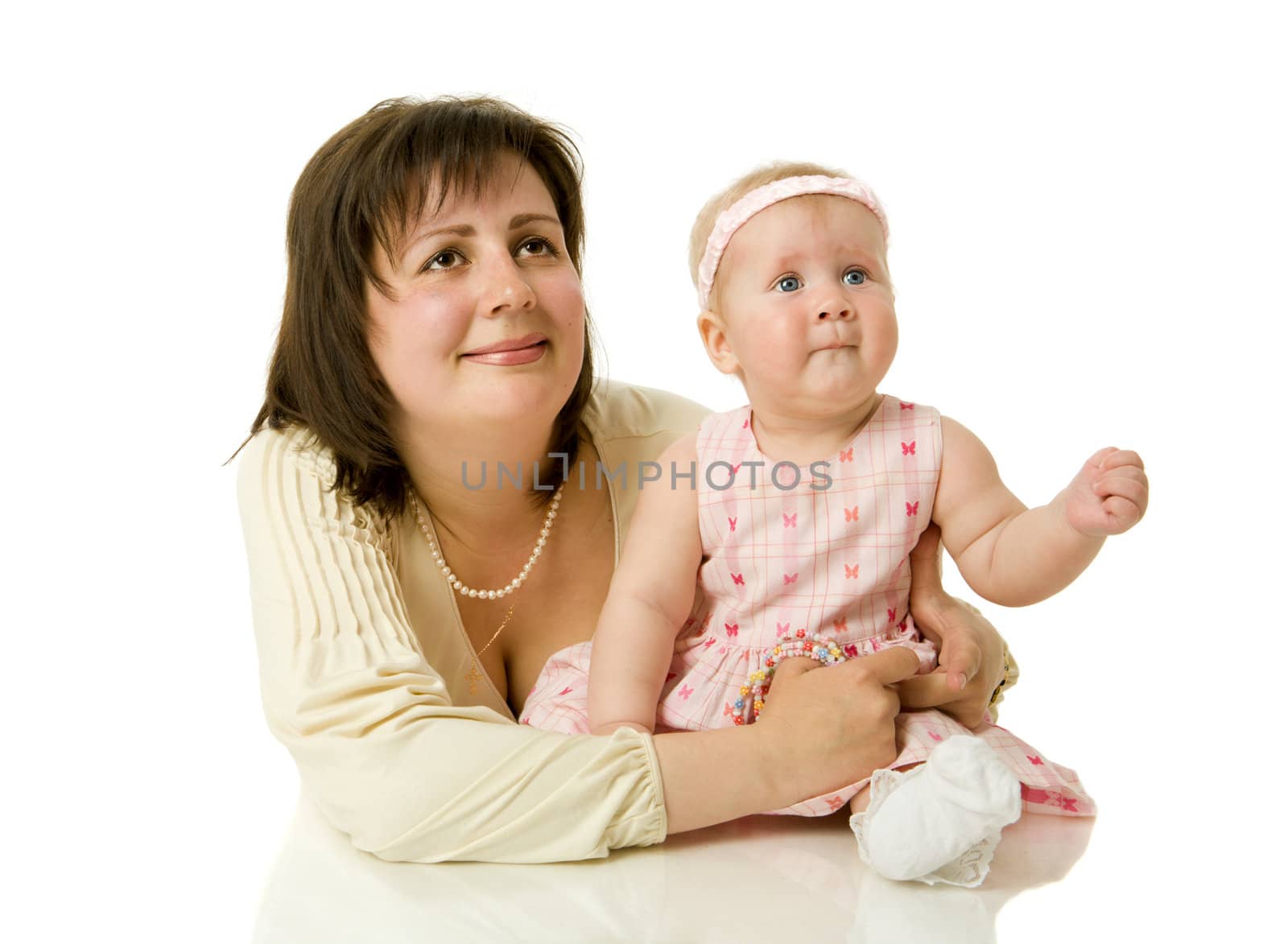 Mother with daughter sitting on chair isolated on white