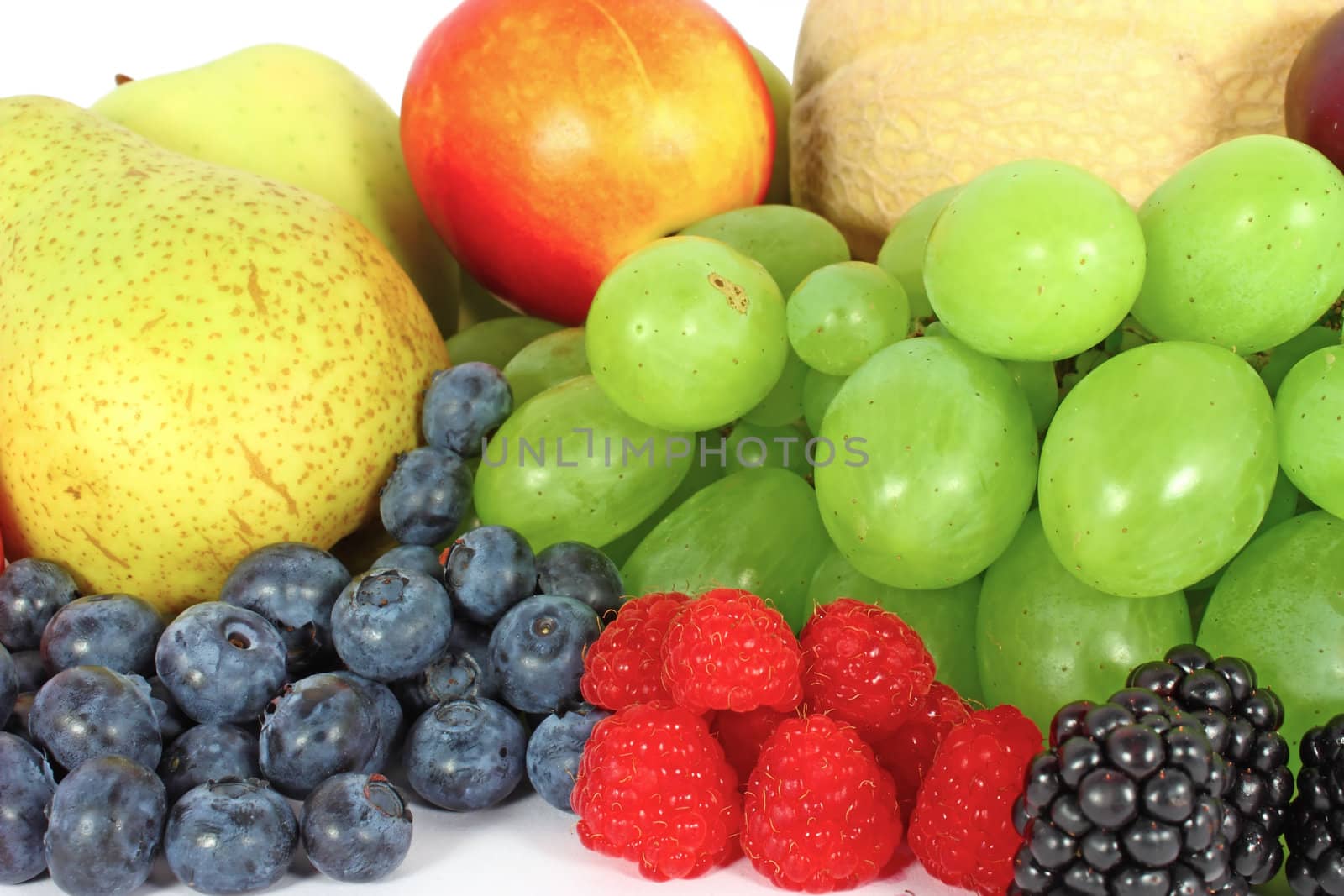 Mix of juicy fruit  isolated on white
