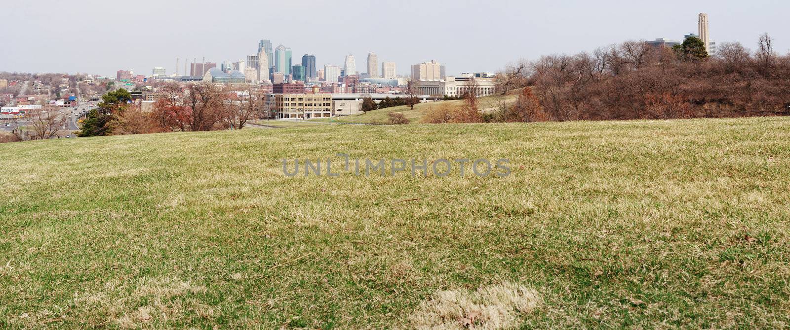 A very large panoramic view of all of the Kansas City skyline.  