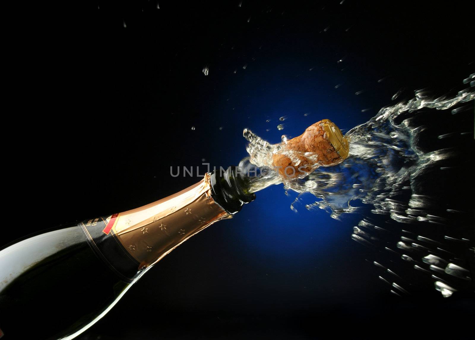 Champagne splash. Bottle and cork, celebration time 