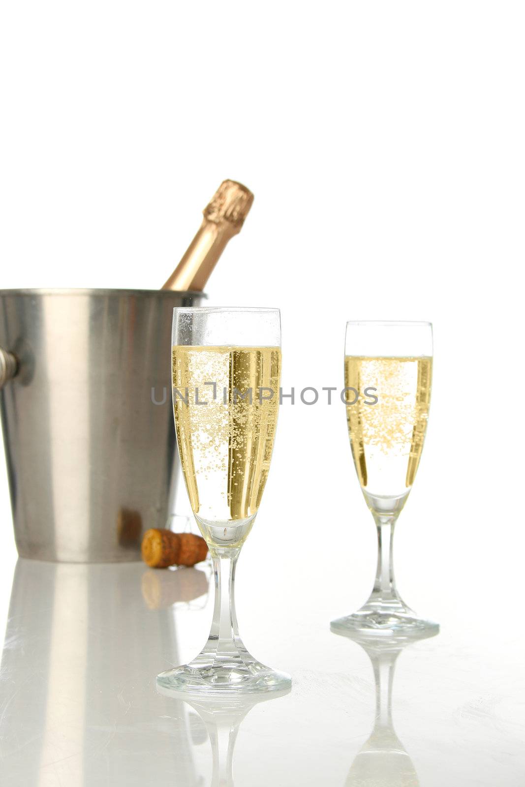 Champagne flutes and ice bucket, festive combo.