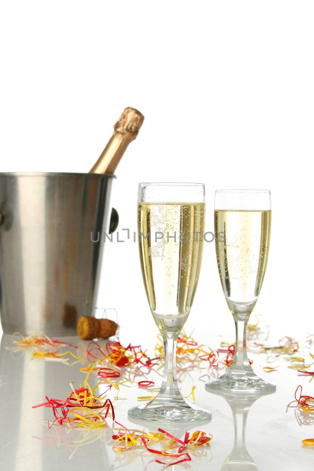 Champagne flutes and ice bucket, festive combo.