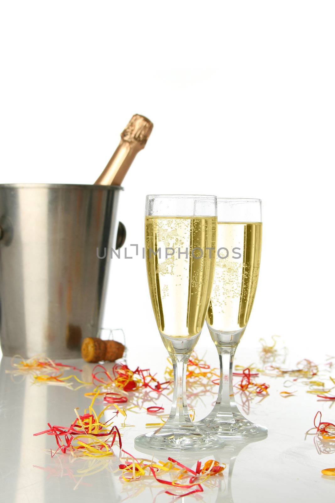 Champagne flutes and ice bucket, festive combo.