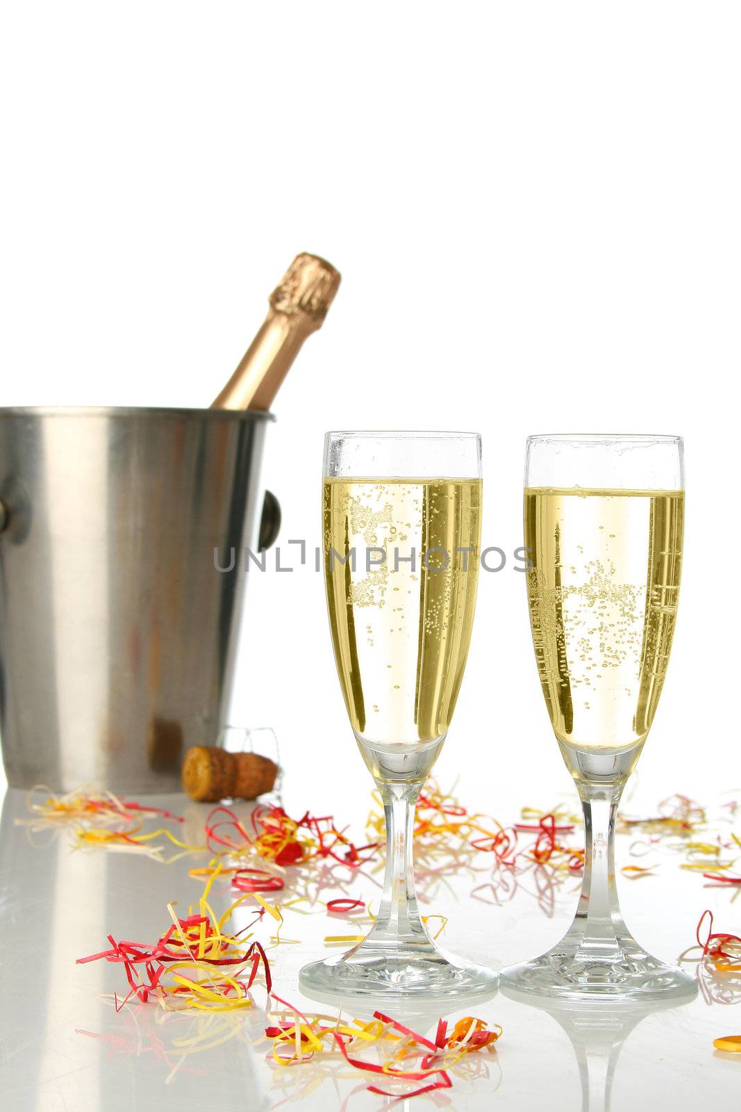 Champagne flutes and ice bucket, festive combo.