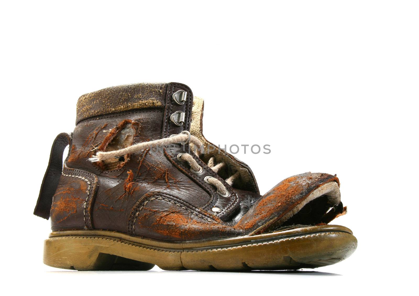 Old and bronken shoe. White background