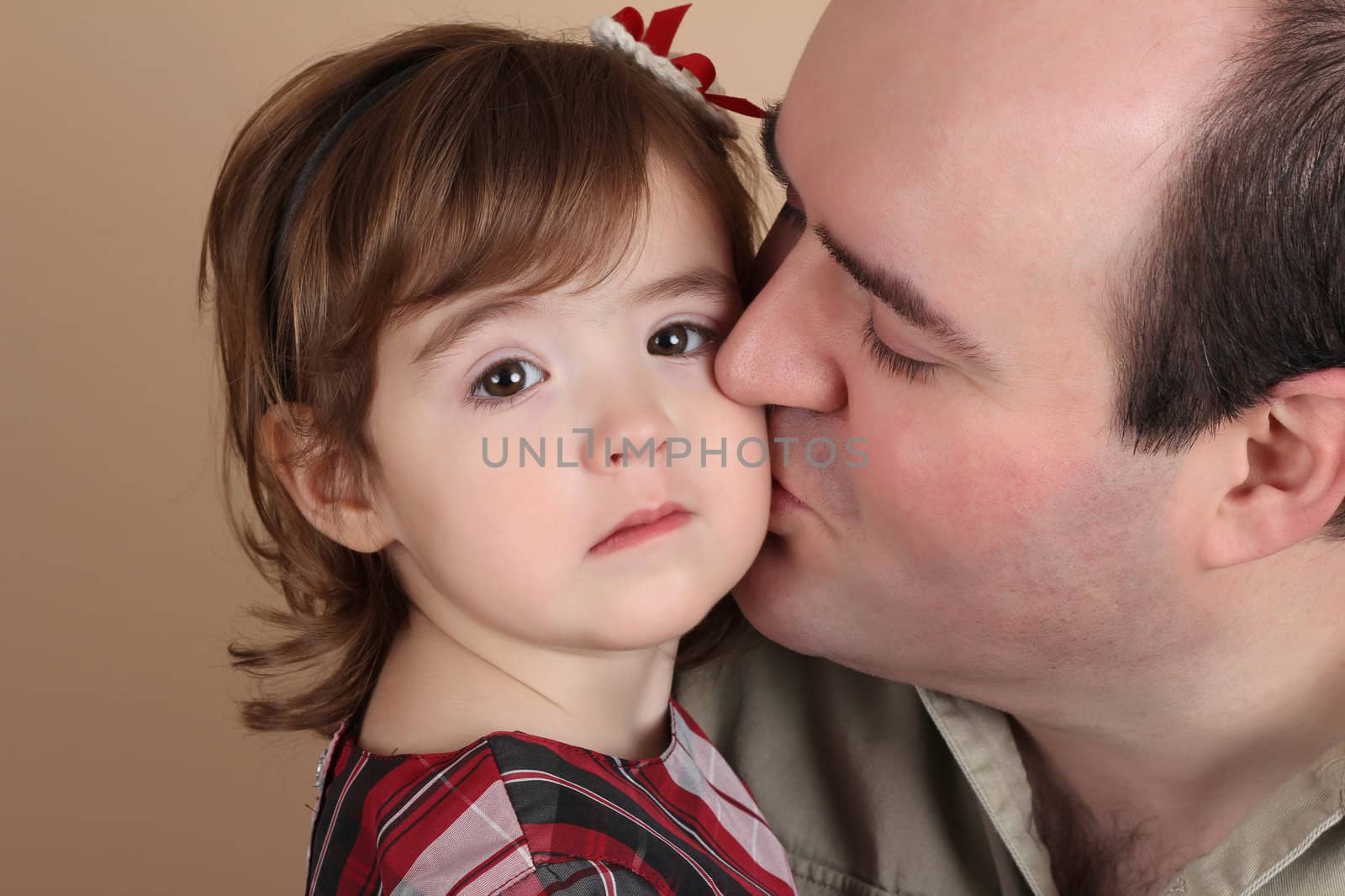 Portrait of a beautiful girl and her father