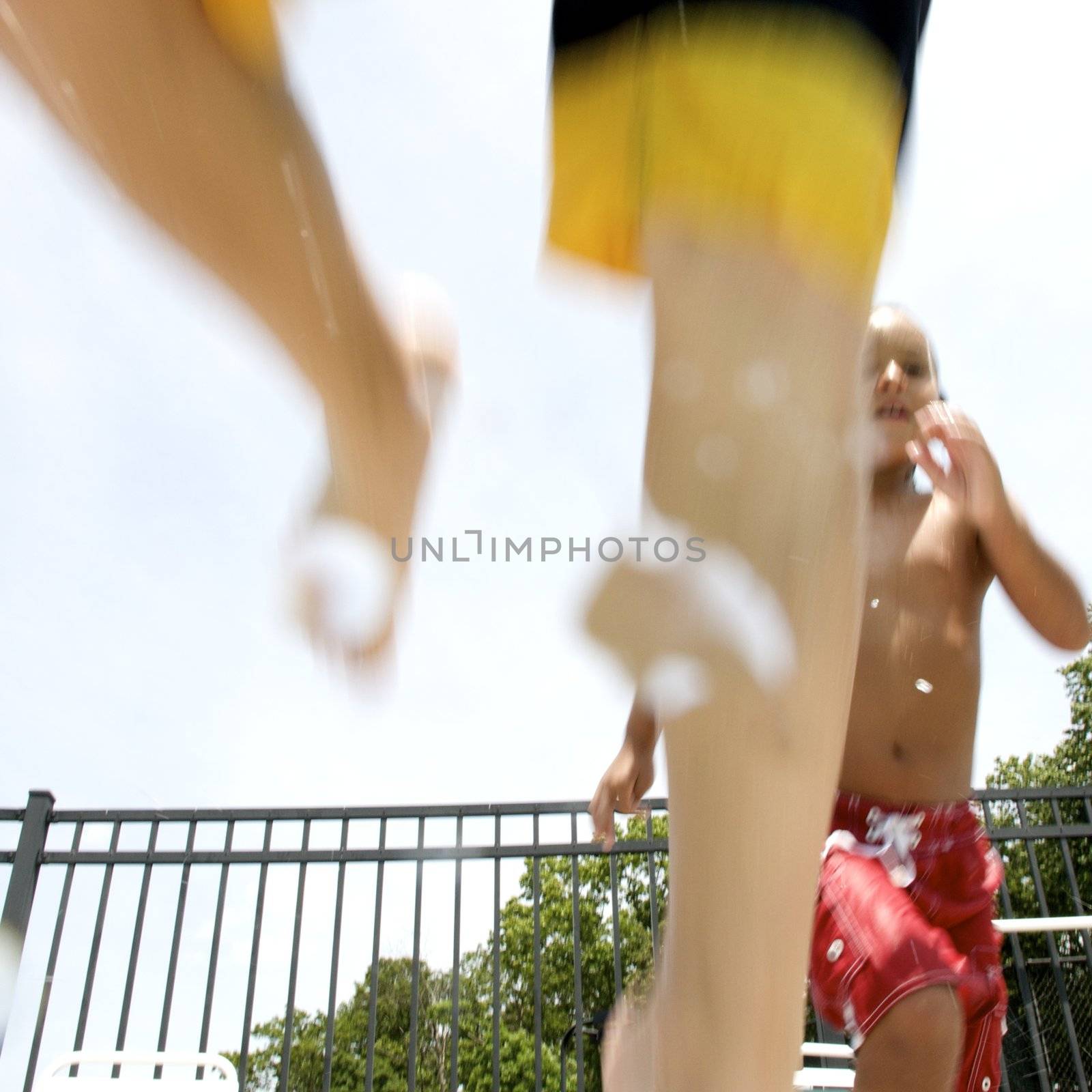 Friends playing at the pool