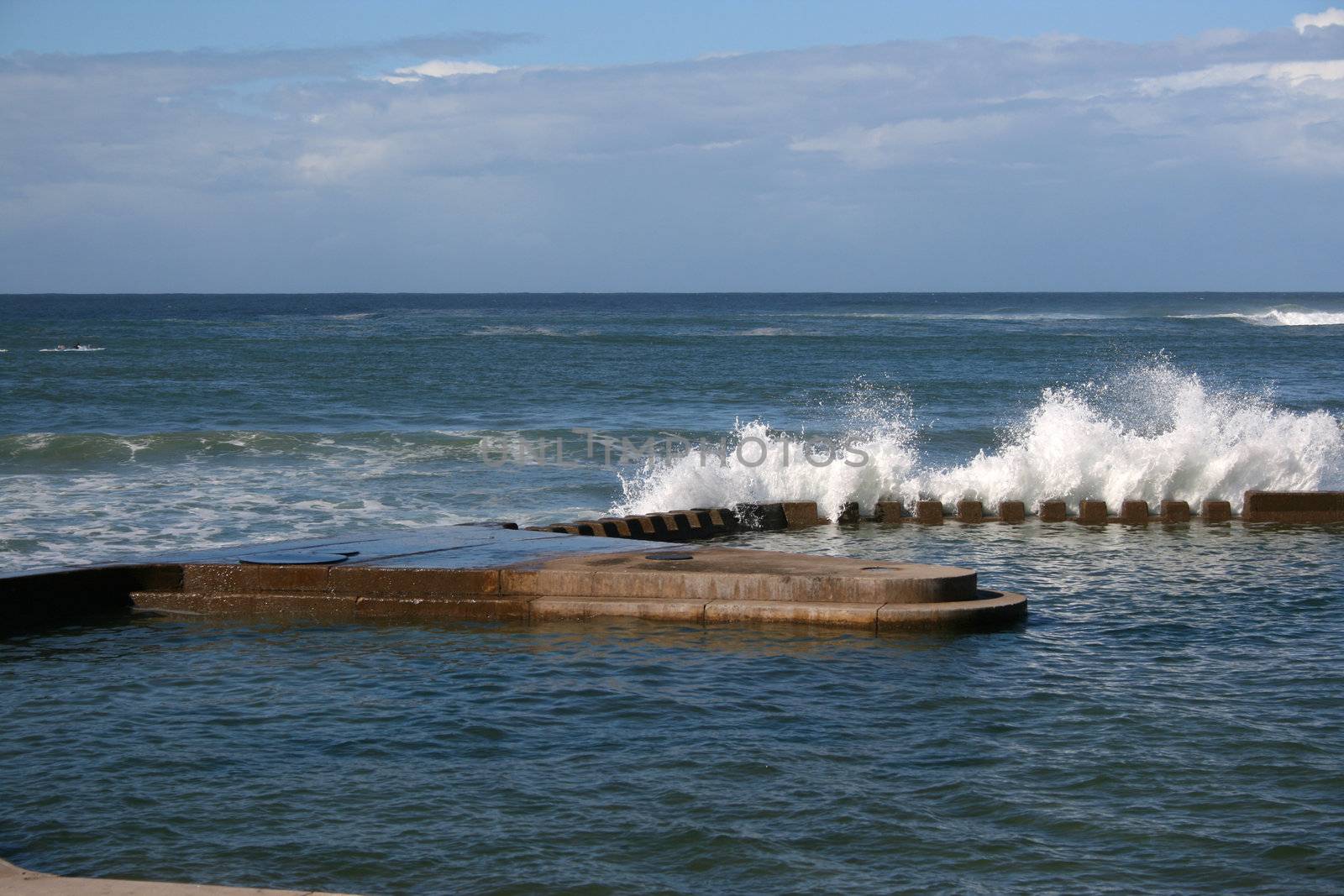 Swimming Pool connceted to the ocean at high tide