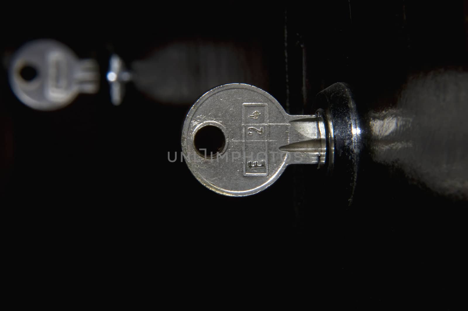 keys in a metal locker, glossy and  dark