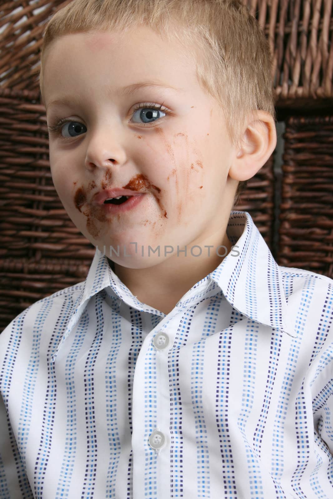 Beautiful blond boy with blue eyes and a dirty mouth