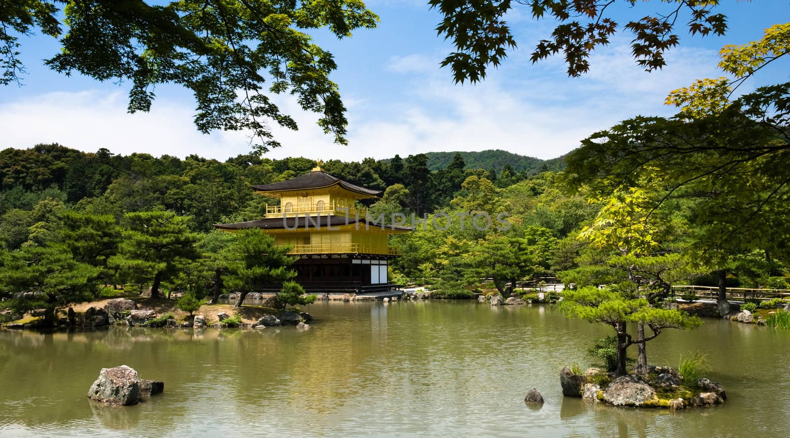 Kinkaku-ji, or formally Rokuon-ji, is a Zen Buddhist temple in Kyoto, Japan. The top two stories of the pavilion are covered with pure gold leaf.