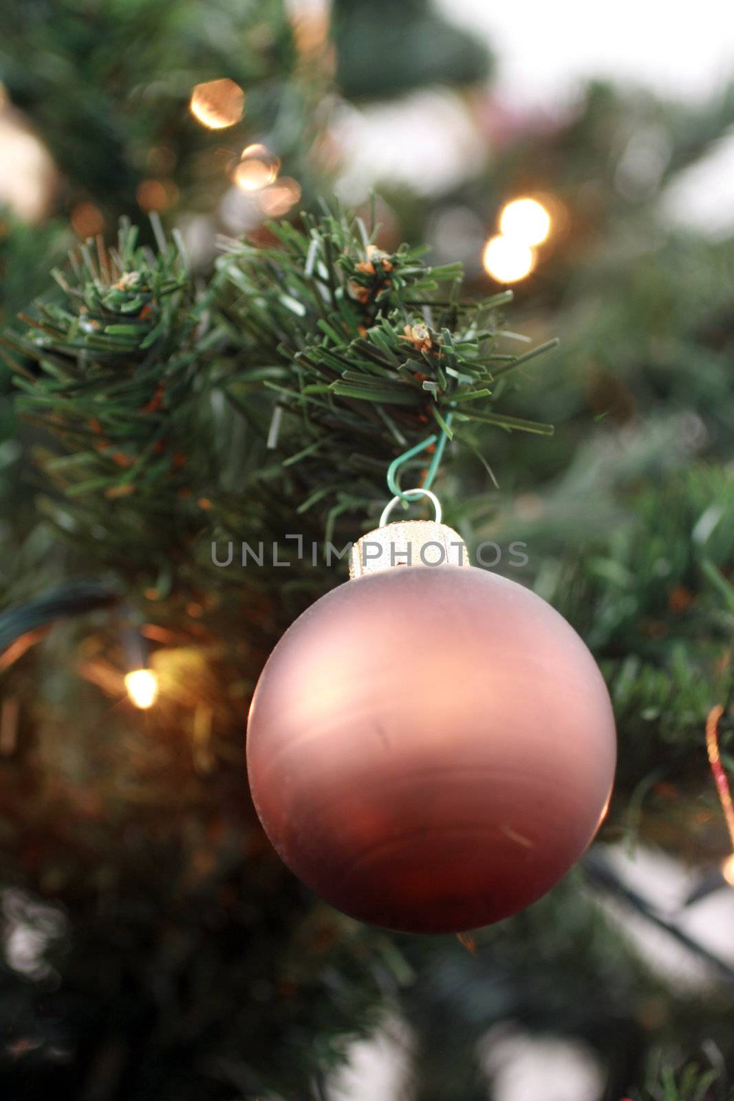bronze bauble on a christmas tree