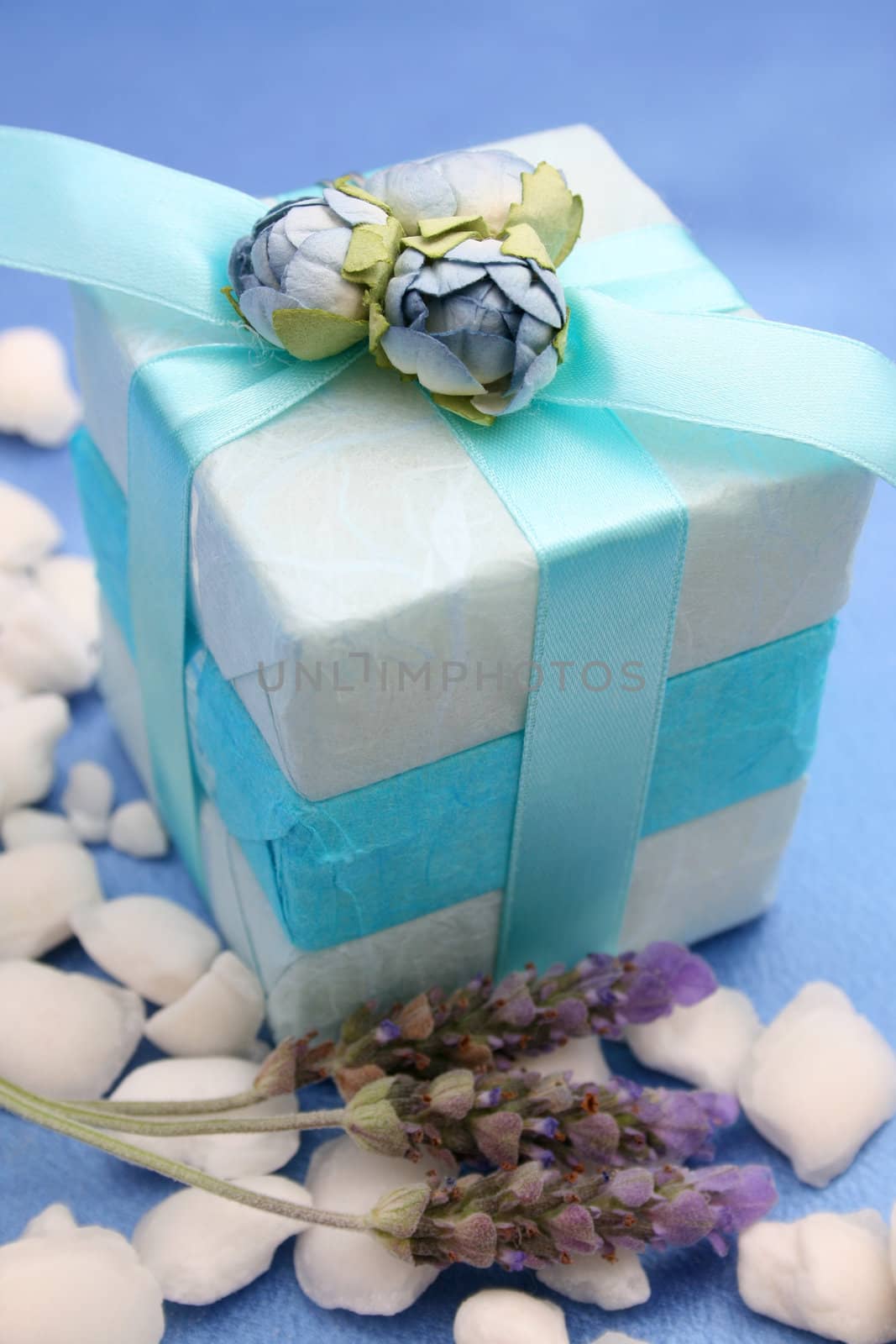 Soap gifts in wrapped in blue with white bath crystals