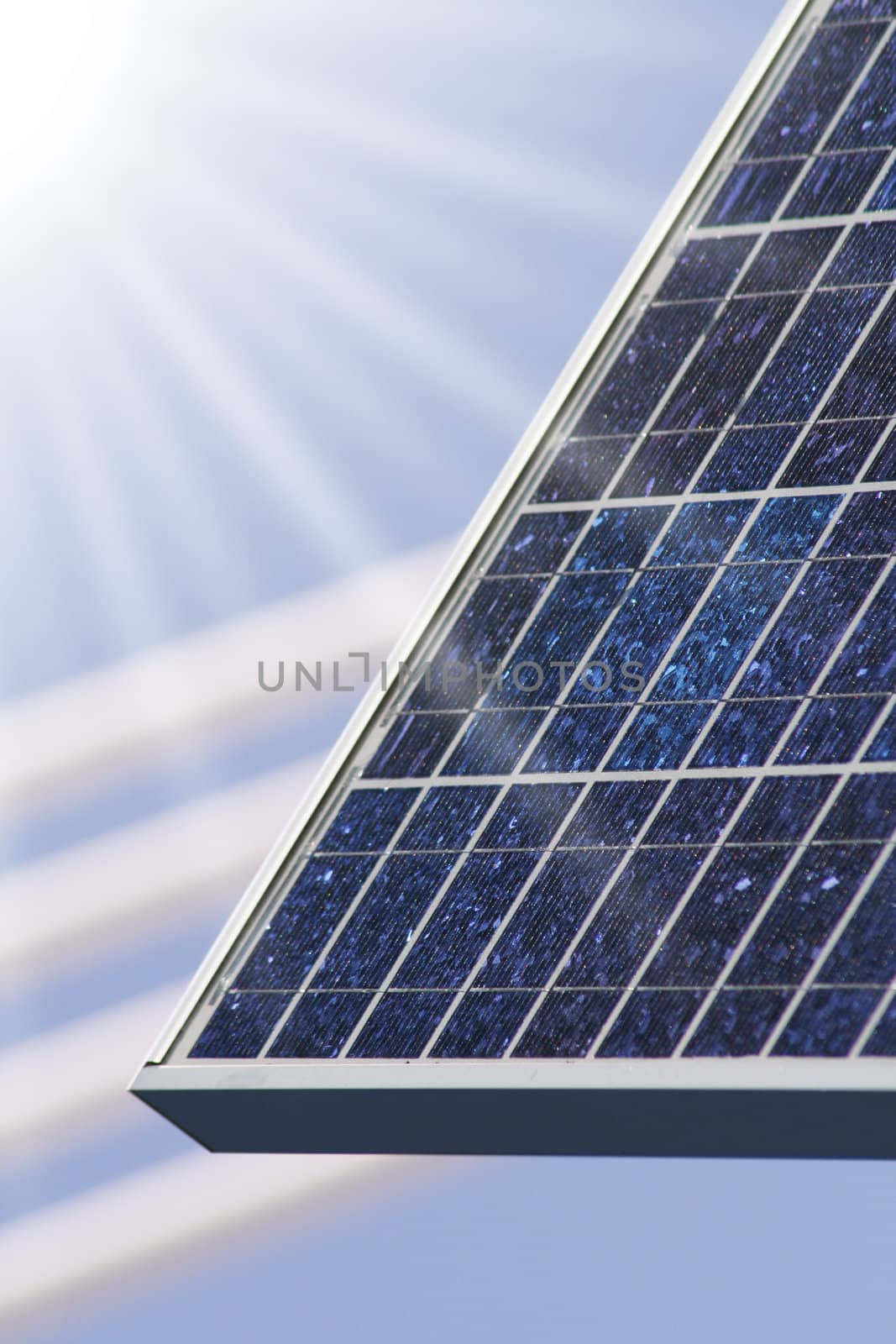 solar panel with blue sky an sunbeam