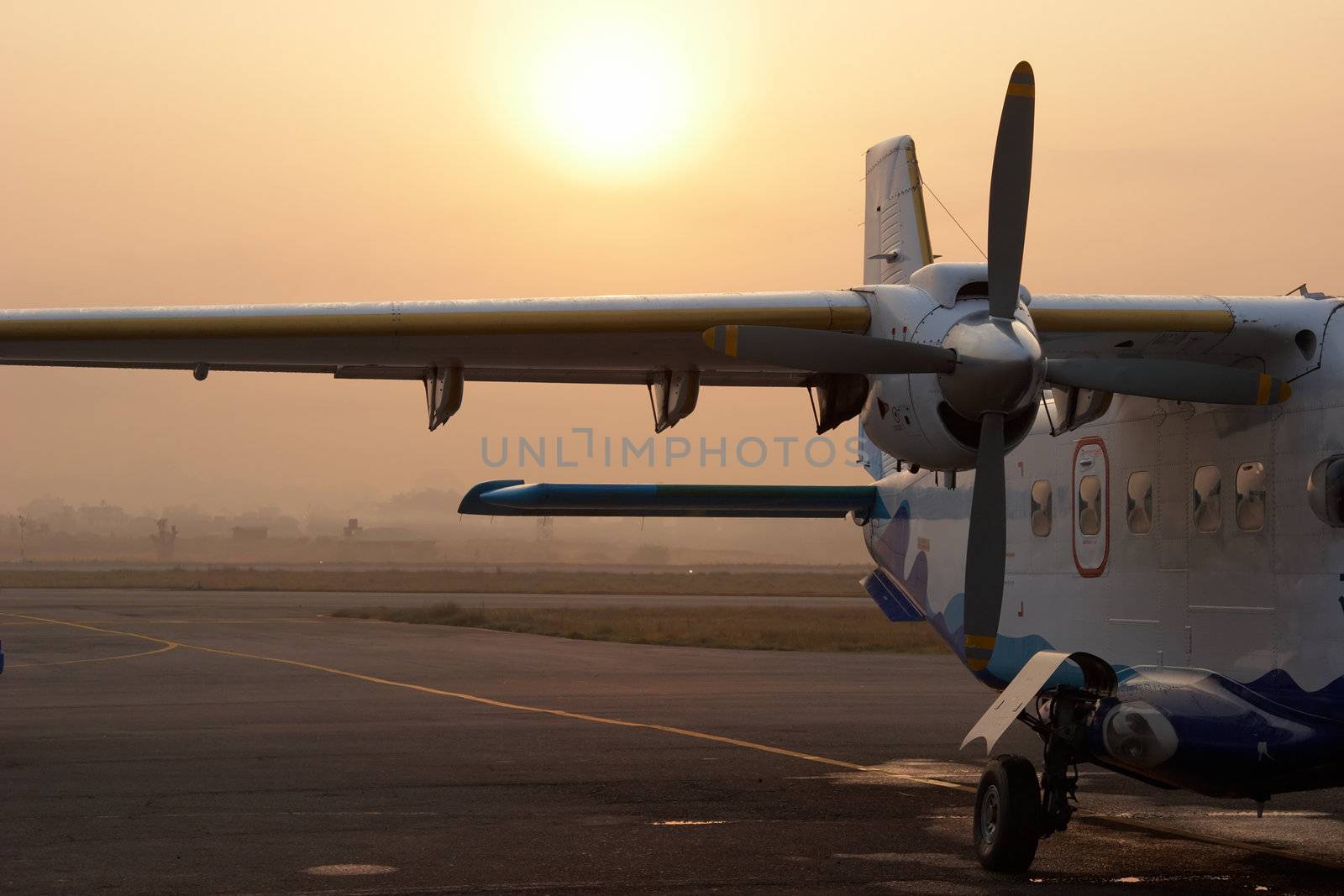Small airplane in Kathmandu airport, Nepal by azotov