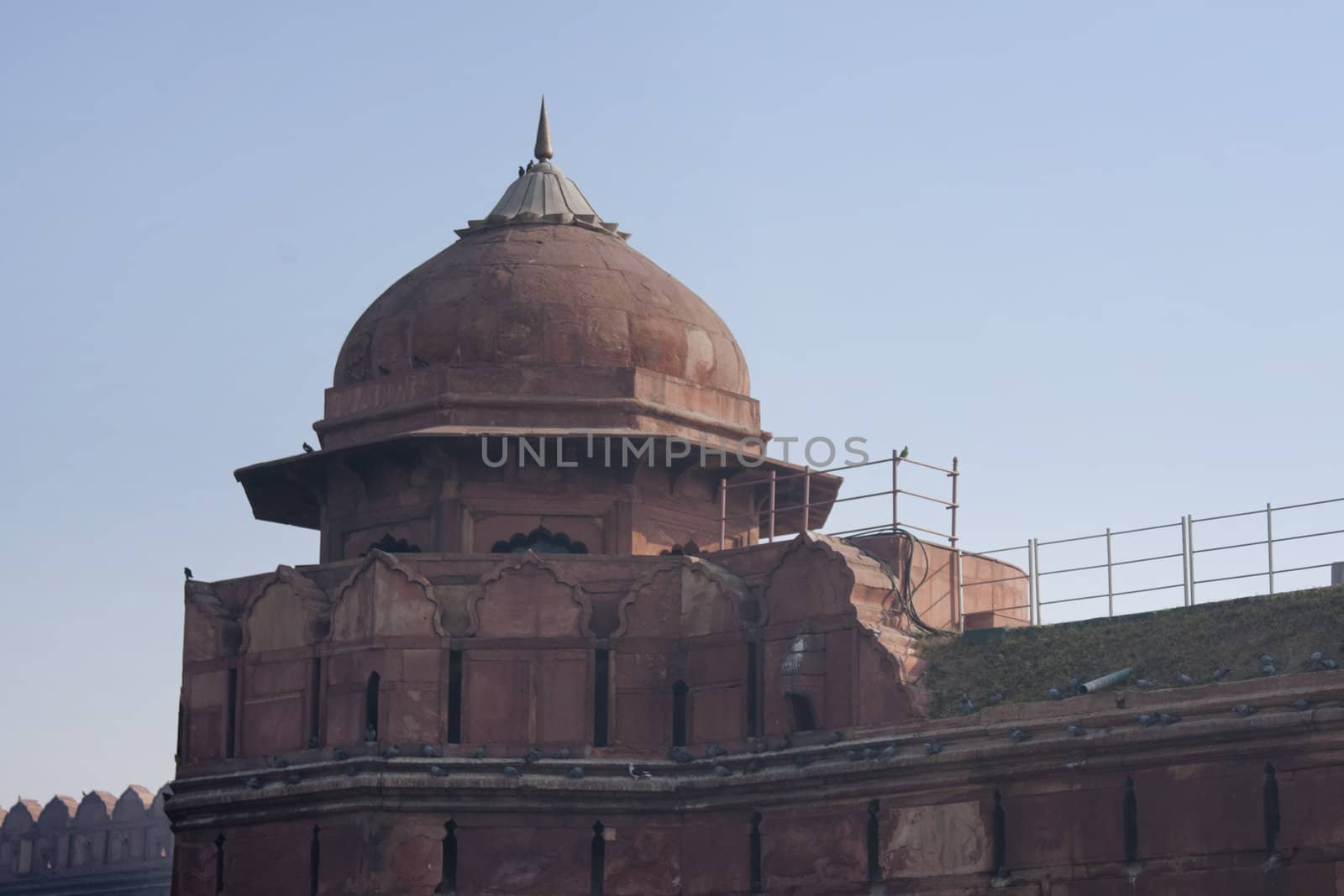 Corner with dome of the defensive wall at Red Fort. by Claudine