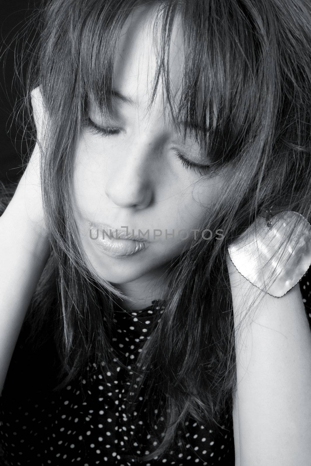 Close up of a teen model with closed eyes