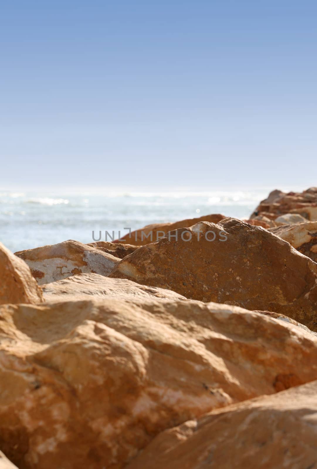 Rocks in the foreground, horizon in the background
